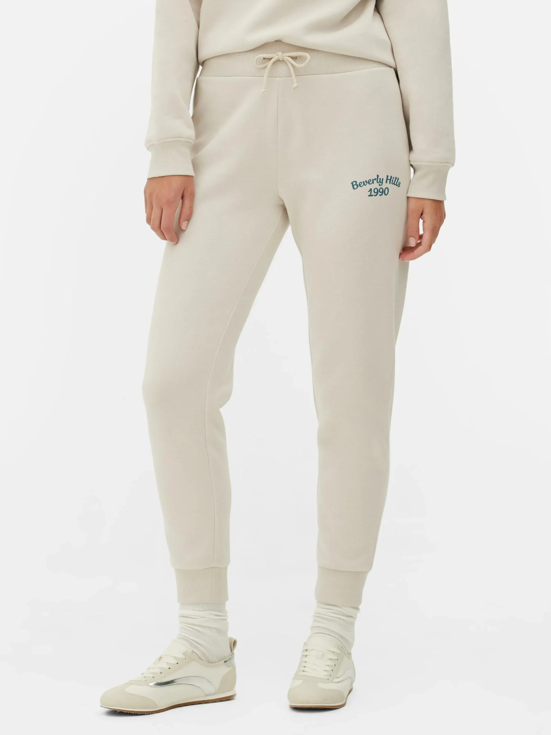 Pantalones De Chándal Pitillo Con Estampado Gráfico